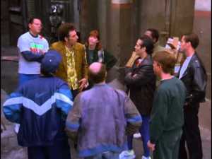 "Who doesn't want to wear the ribbon?"   What does Kramer believe?  What does he DO?