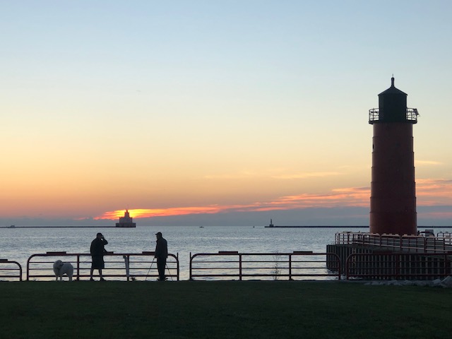 Milwaukee Harbor entrance and lighthouse, at sunrise.
